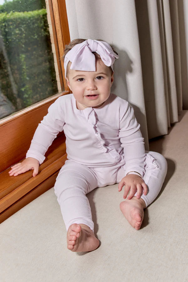 Bambi & Birdie Ruffle Zipper Footie || Mauve