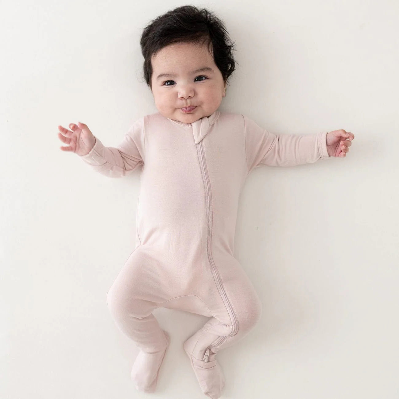 Kyte Baby Zippered Footie || Blush